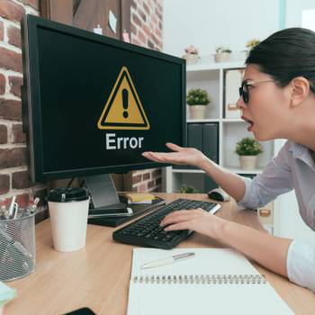 sadness suit woman sitting on working desk